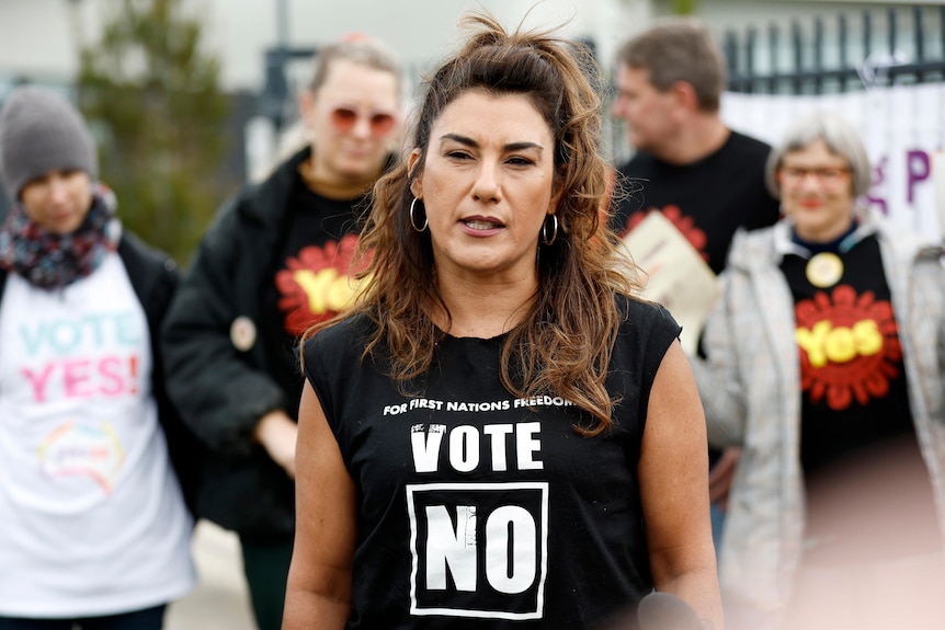 Senator Lidia Thrope wearing a black top that says Vote No