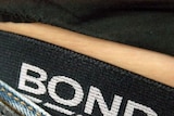 A pair of Bonds unerpants stick out over the top if a pair of jeans