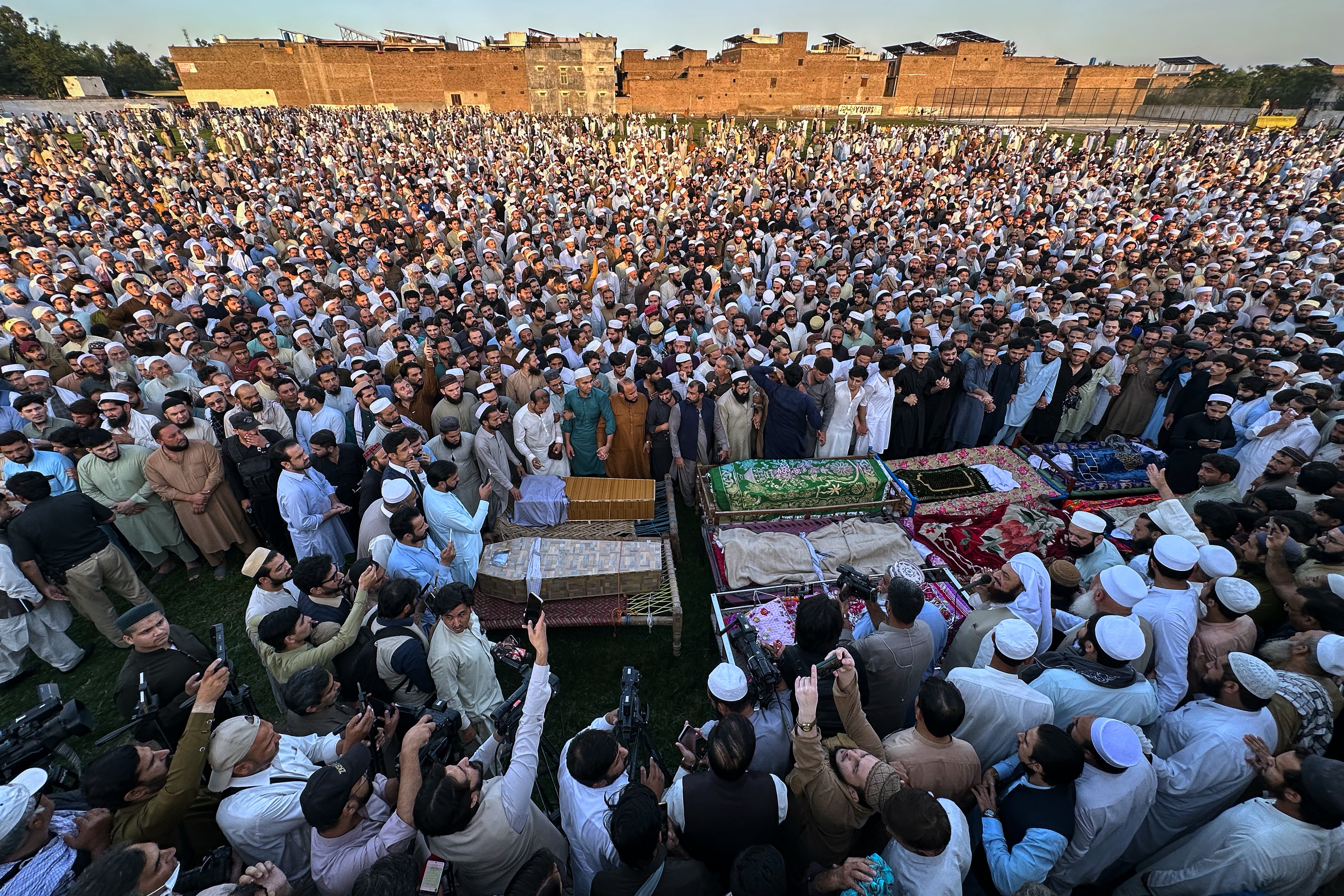 Thousands mourn 34 children killed in Pakistan school roof collapse