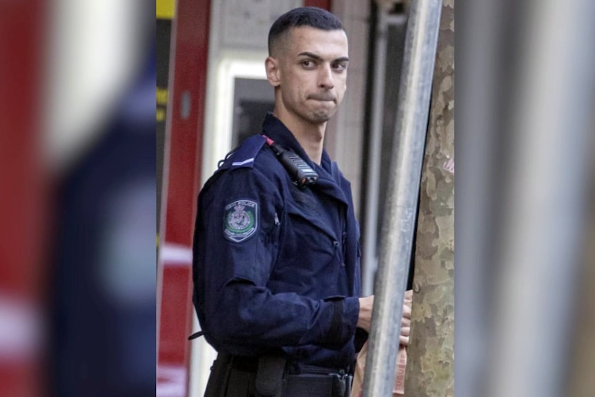 Senior Constable Beau Lamarre-Condon looking sideways the officer is accused of killing two young men
