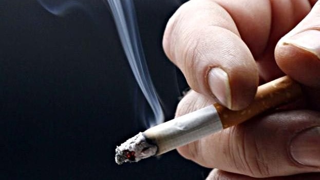Swansea MP Garry Edwards wants his battle with lung cancer to be a warning to others about the dangers of smoking.