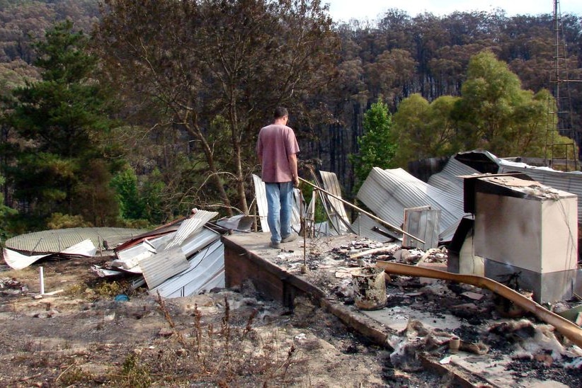 Robert Bruton looks over what used to be his house