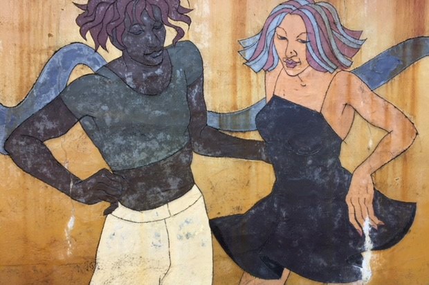 Part of a mural showing two women on a retaining wall at the Northbridge Tunnel entrance on the Graham Farmer Freeway.