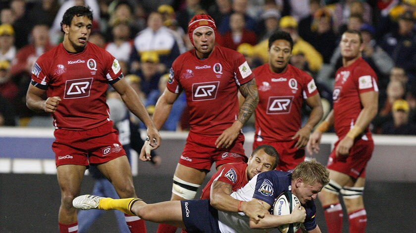 Reds run over...Josh Valentine helped the Brumbies to a four-tries-to-nil victory over Queensland.