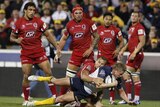 Reds run over...Josh Valentine helped the Brumbies to a four-tries-to-nil victory over Queensland.