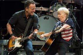 Vel Holland on stage with Bruce Springsteen in Perth