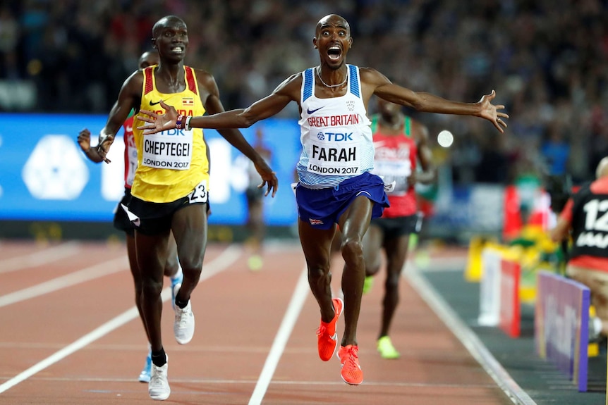 Mo Farah of Britain celebrates after winning.