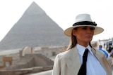 US first lady Melania Trump stands in front of a pyramid in Egypt.