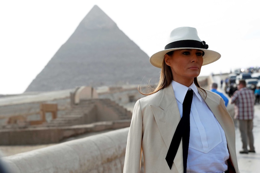 US first lady Melania Trump stands in front of a pyramid in Egypt.