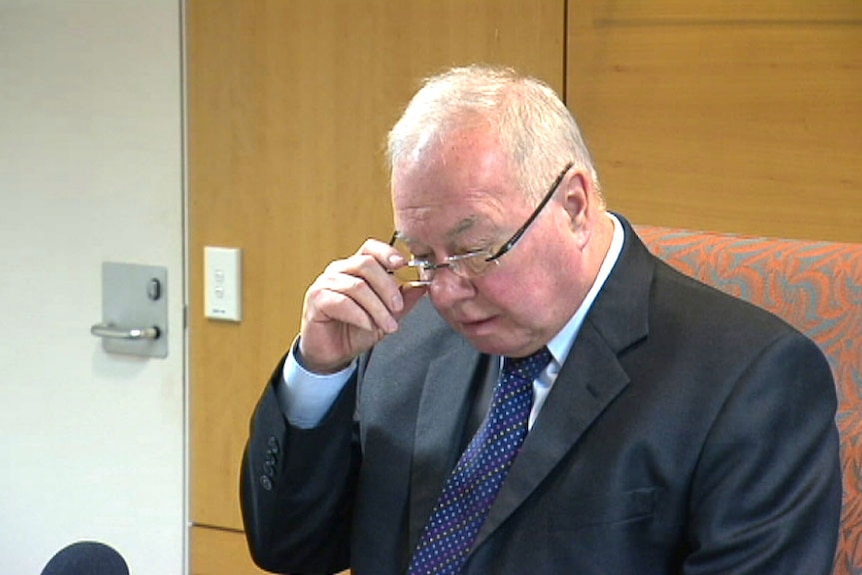 SA Independent Commissioner Against Corruption Bruce Lander presides over a public inquiry.