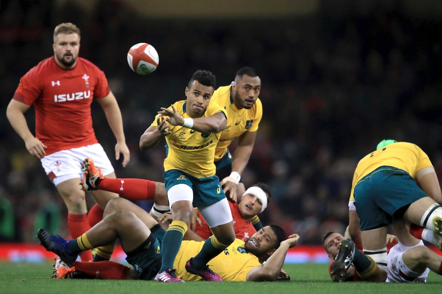 Wallabies' Will Genia passes the ball against Wales