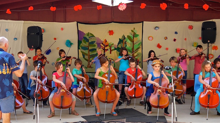 Cape Byron Steiner students playing cello and violin