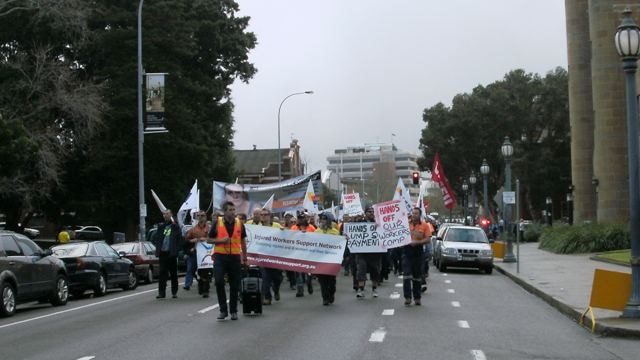 Newcastle workers march to Civic park rally