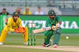 Mohammad Hafeez plays a shot for Pakistan against Australia at the MCG