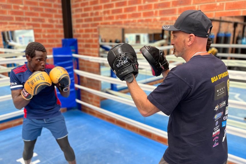 Two men in a boxing ring