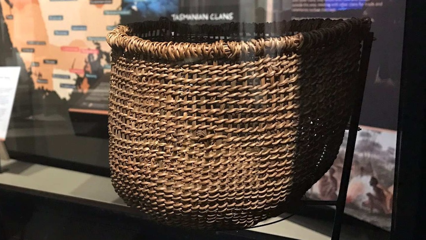 Woven basket on display at Aboriginal history exhibition.