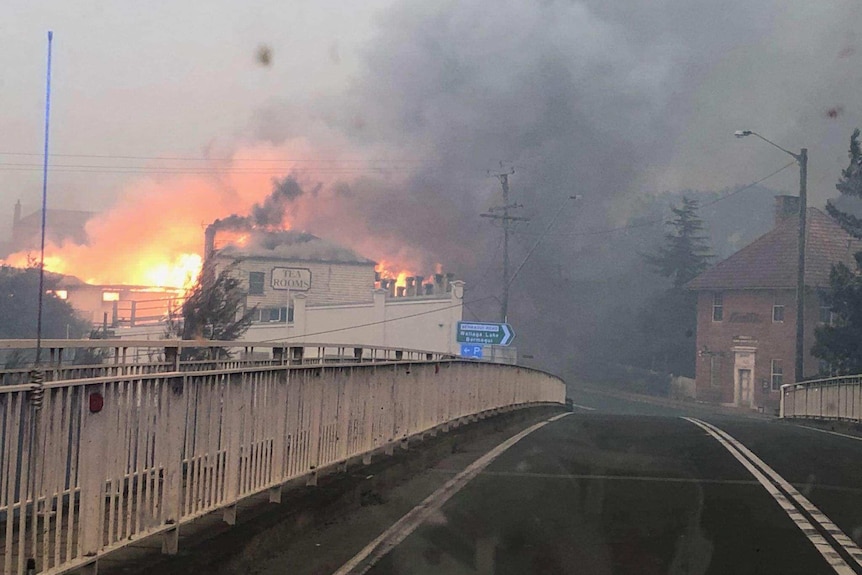 Buildings completely alight in the town.