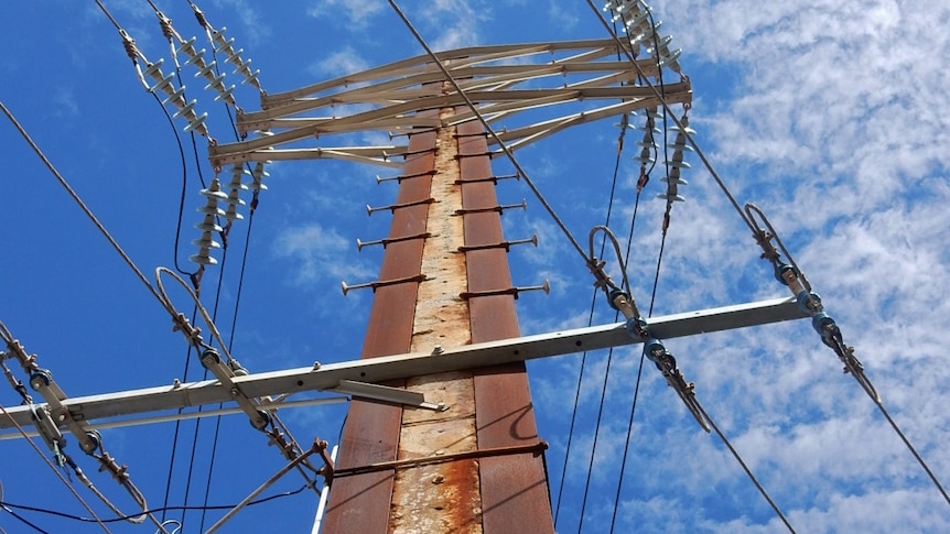 A towering power pole