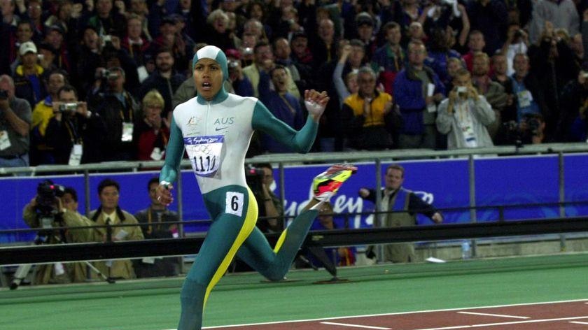 Cathy Freeman crosses the finish line to win the Womens 400m final at the 2000 Sydney Olympics.