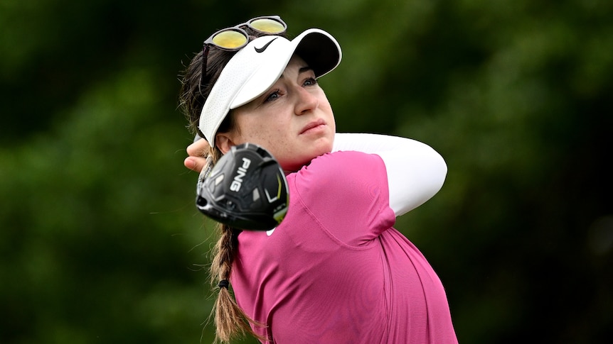 Female golfer Gabriela Ruffels follows-through with her driver, after a tee shot