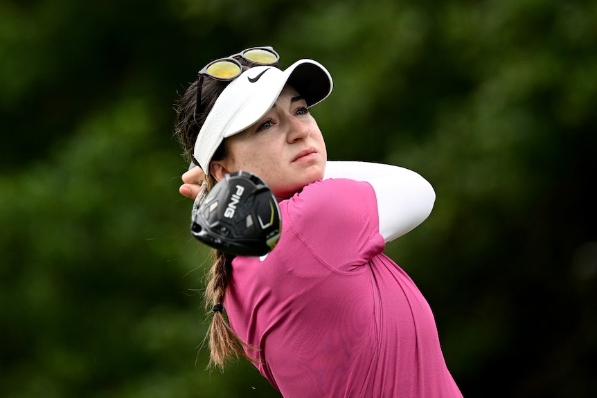 Female golfer Gabriela Ruffels follows-through with her driver, after a tee shot