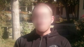 Blurred face of Brenton Tarrant pictured in Pakistan.