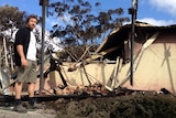 Steve outside his burnt out property