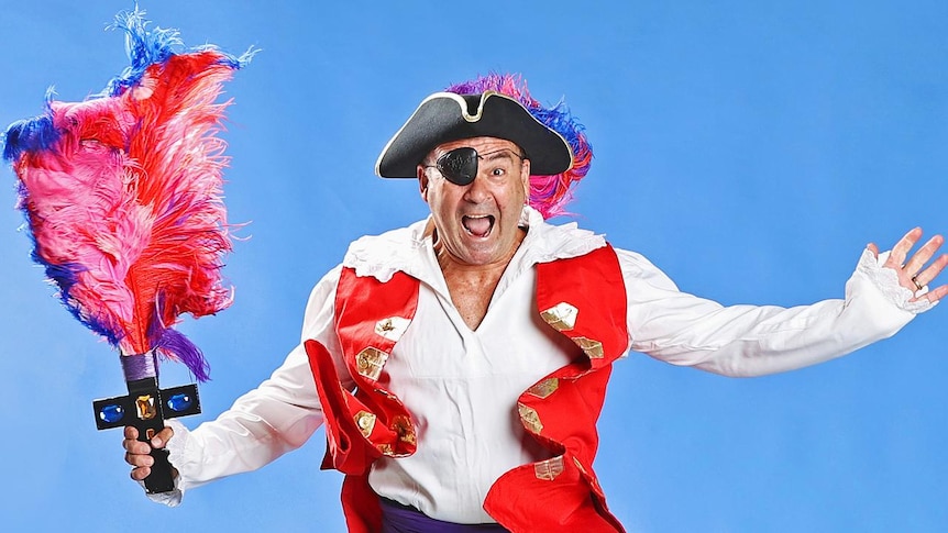 Captain Feathersword from the Wiggles smiles at camera