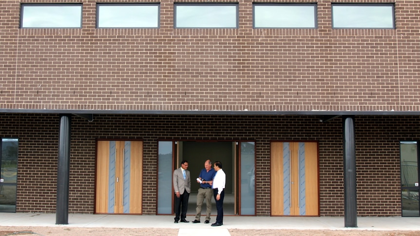 Planners meet outside of Gungahlin mosque.