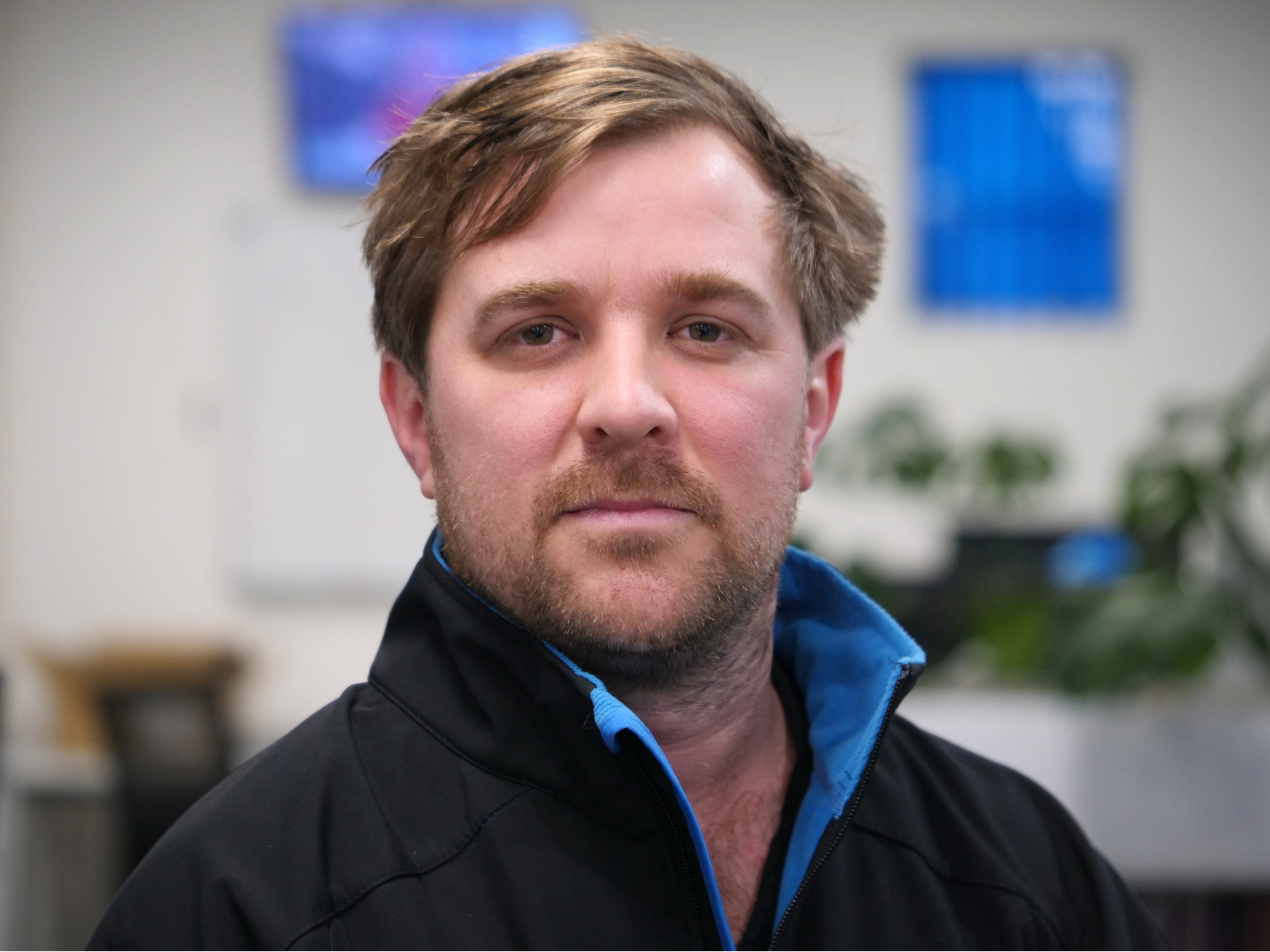 Man looking at camera with serious expression