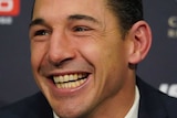 Billy Slater smiles during retirement announcement