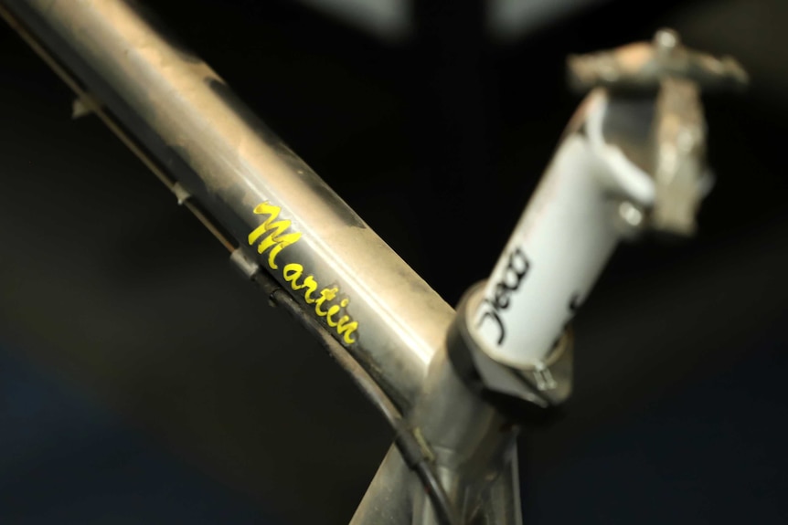 a close up of a bar on a bicycle with the name Martin in stickers