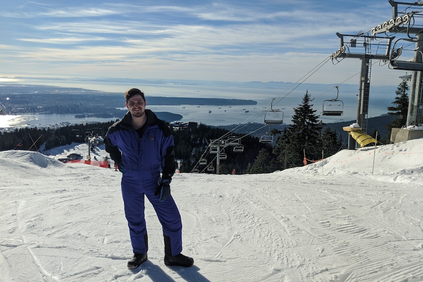 Mitch Broom stands on a ski field in Canada