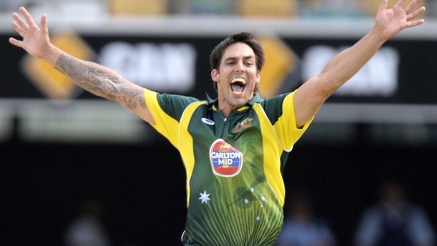 Mitchell Johnson celebrates a wicket at the Gabba