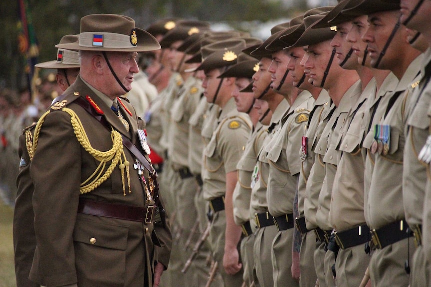 Sir Peter Cosgrove inspects troops.