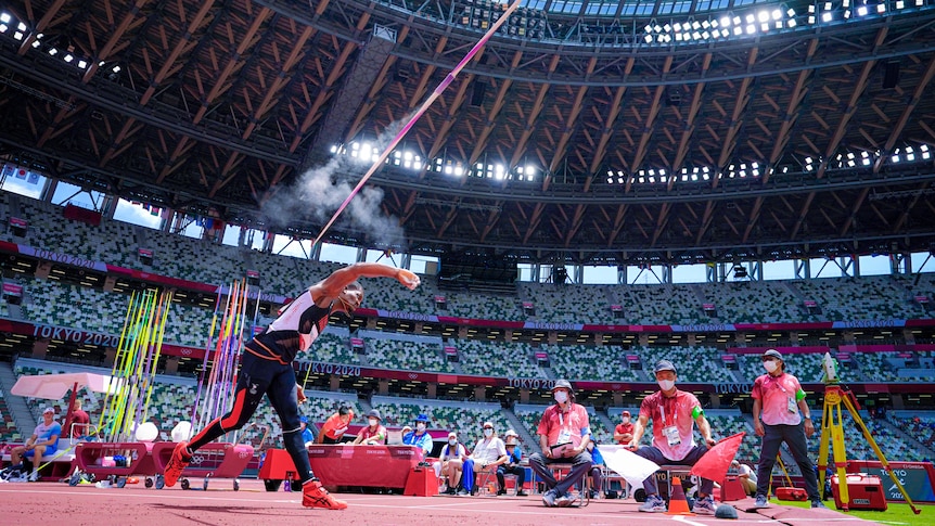 Keshorn Walcott throws a javelin in Tokyo's Olympic stadium 