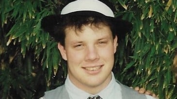 Jeffrey Brooks, who was found dead at the crayfish farm he worked in 1996, wearing a black and white hat and smiling