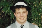 Jeffrey Brooks, who was found dead at the crayfish farm he worked in 1996, wearing a black and white hat and smiling