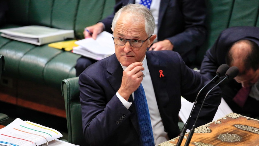 Prime Minister Malcolm Turnbull sits in Parliament.