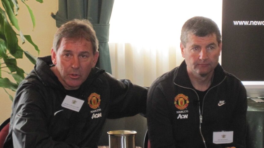 Former Manchester United players Bryon Robson (left) and Denis Joseph Irwin during a visit to Newcastle.