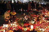 Tears and candles: people gather in front of the presidential palace in Warsaw to pay their respects
