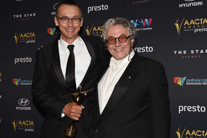 Australian director George Miller and producer P.J. Voeten after winning the AACTA for Best Director and Best Film for Mad Max Fury Road