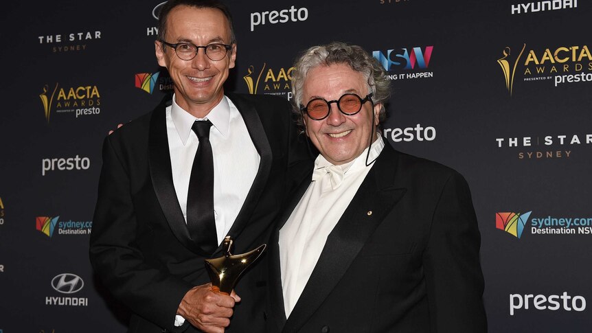 Australian director George Miller and producer P.J. Voeten after winning the AACTA for Best Director and Best Film for Mad Max Fury Road