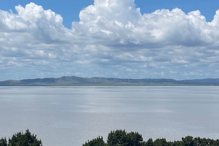 Clouds above lake full of water