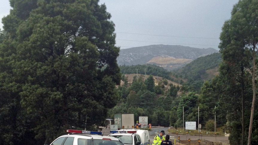 Police cars outside the gates of the Mount Lyell copper mine, Tasmania, Jan 17 2014.