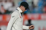 Australia captain Steve Smith walks off the field after day three in Dharamsala