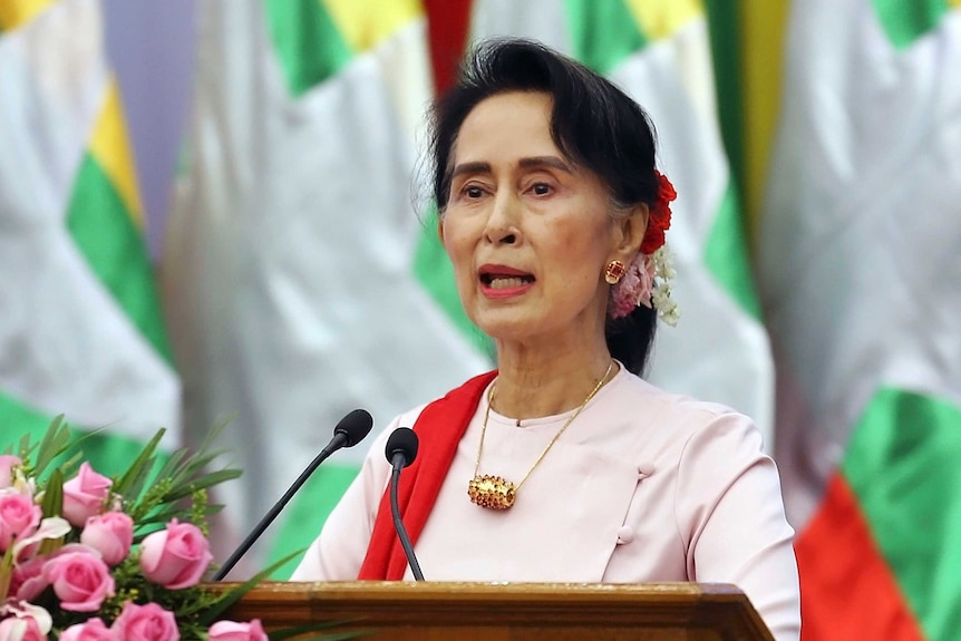 Myanmar's State Counsellor Aung San Suu Kyi delivers an opening speech.