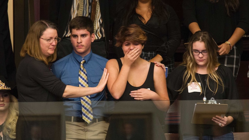 Students cry in the east gallery of the House of Representatives