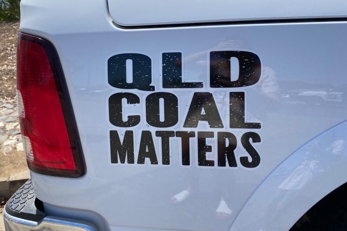 The back of a ute with a sticker which reads qld coal matters