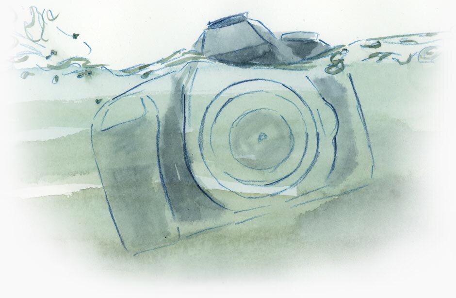 Camera sinking into water.